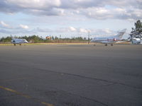 Allen Parish Airport (ACP) - Jet charters setting on ramp awaiting casino guest to return. - by Joel Johnson