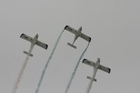 RAF Fairford Airport, Fairford, England United Kingdom (EGVA) - Texan Team, three disabed pilots flying close formation in these ultra lights - taken at the Royal International Air Tattoo 2010 - by Steve Staunton