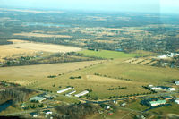 Napoleon Airport (3NP) - My daughter took this photo from the backseat of our 172 as we were departing on the downwind leg back to TTF (Monroe Custer). Napoleon is a beautiful airport.... Wide long smooth runways, Great lunch at the Napoleon Cafe, a short walk from the parking ar - by 78-0001