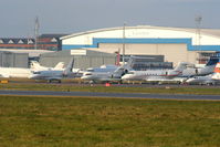 London Luton Airport - Bizjets at Luton Airport amongst which are: Hawker 900XP P4-PET, Bombardier CL300 G-MEGP, Gulfstream 5 VQ-BLA and Gulfstream 200 HB-JKE - by Chris Hall