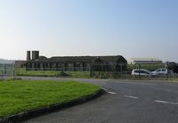 Pembrey Airport, Pembrey, Wales United Kingdom (EGFP) - The remains of buildings used as the WAAF Institute situated on the former RAF Station Pembrey technical site. - by Roger Winser