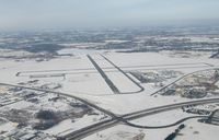 Chandler Field Airport (AXN) - Overview of a snowy AXN. - by Kreg Anderson