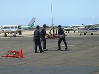 Kalaeloa (john Rodgers Field) Airport (JRF) - Rescued Jet Pilot!-JRF ramp in front of Hangar 111. 2003 - by Ewa Marine