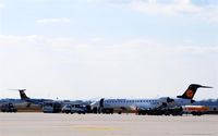 Leipzig/Halle Airport, Leipzig/Halle Germany (EDDP) - Unloading and loading of a CRJ 700 takes a lot of cars and people..... - by Holger Zengler