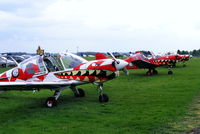 Kemble Airport, Kemble, England United Kingdom (EGBP) - Bulldogs of Power Aerobatics Ltd	lined up at Kemble - by Chris Hall