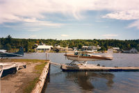 Greenville Seaplane Base (52B) - Seaplane Fly In , Moosehead Lake. In the background DC-3 on floats - by Henk Geerlings