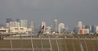 Miami International Airport (MIA) - Looking down Runway 12 towards Downtown Miami - by Florida Metal