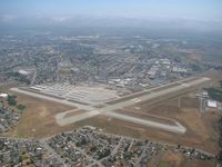 Watsonville Municipal Airport (WVI) - A view of Watsonville Municipal Airport on a right downwind departure for runway 20.  - by Ted Ziemba