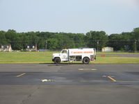 Orange County Airport (OMH) - Orange fuel truck - by Ronald Barker
