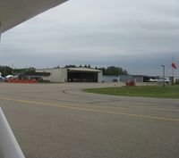 Montevideo-chippewa County Airport (MVE) - View of the hangar where breakfast is being served. - by Kreg Anderson