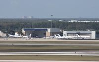 Orlando International Airport (MCO) - Biz jets on west ramp - by Florida Metal