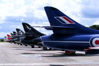 Kemble Airport, Kemble, England United Kingdom (EGBP) - Line up of Hunter's at the Cotswold Airshow  - by Chris Hall