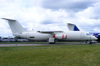 Kemble Airport, Kemble, England United Kingdom (EGBP) - unmarked BAe 146 in storage at Kemble - by Chris Hall