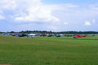 Turweston Aerodrome Airport, Turweston, England United Kingdom (EGBT) - Sixty helicopters at Turweston used for ferrying race fans to Silverstone for the British F1 Grand Prix - by Chris Hall