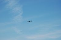 Wallops Flight Facility Airport (WAL) - Sikorsky MH-60 Seahawk over the NASA Wallops Flight Facility, Wattsville, VA - by scotch-canadian
