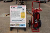 Dover Afb Airport (DOV) - Information Plaque for the 1967 McDonnell Douglas C-9A Nightingale and Aircraft Fire Extingisher at the Air Mobility Command Museum, Dover AFB, DE - by scotch-canadian