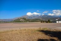 Calvi Sainte-Catherine Airport - The airport is surrounded by the mountains - by Michel Teiten ( www.mablehome.com )