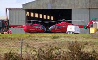 Swansea Airport, Swansea, Wales United Kingdom (EGFH) - Nose to nose. Visiting and resident Wales Air Ambulance helicopters - by Roger Winser