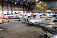 Shobdon Aerodrome Airport, Leominster, England United Kingdom (EGBS) - inside the main hangar at Shobdon - by Chris Hall