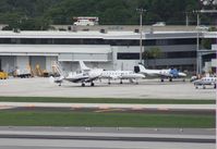 Fort Lauderdale/hollywood International Airport (FLL) - Mix of planes on the GA ramp including a Metro and a Beech 18 - by Florida Metal