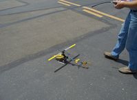 Santa Paula Airport (SZP) - T-REX radio-controlled helicopter, electric motor start and pre-takeoff - by Doug Robertson