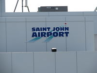 Saint John Airport - building sign on the terminal  - by Peter Pasieka