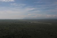 Baucau Airport - Baucau RW 32 approach in the back and 14 is on the right side of the photo (we approaching 14 RW) - by Slava