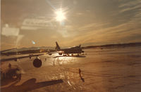 Ted Stevens Anchorage International Airport (ANC) - Sunset at Anchorage Int'l Airport, winter Feb '85 - by Henk Geerlings