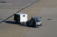 Ronald Reagan Washington National Airport (DCA) - Tug # 136 with baggage cart - by Ronald Barker