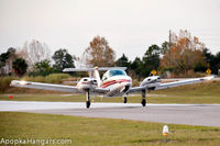 Orlando Apopka Airport (X04) - Duchess lifting off of runway 15. - by ApopkaHangars.com