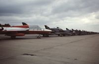 EGVI Airport - Line up of 2 seat Hawker Hunters at IAT 76 held at RAF Greenham Common in July 1976. Celebrating the 25 years since the first flight of the Hunter on 20 July 1951.  - by Roger Winser