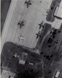 Khorat Air Force Base Airport, Nakhon Ratchasima (Khorat) Thailand (VTUN) - Overhead pattern summer 1972.  Note the F-105 that is in two pieces in the upper right corner. - by Ronald Barker