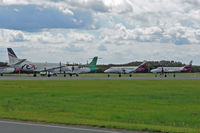 Brisbane International Airport, Brisbane, Queensland Australia (YBBN) - Busy ramp for small cargo props - by Micha Lueck