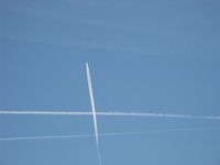 Santa Paula Airport (SZP) - Jet contrails past SZP Rwy 04-22; upper is in unusual heading - by Doug Robertson