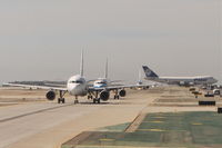 Los Angeles International Airport (LAX) - Looking west down TWY B from C1 at Los Angeles International Airport. - by Mark Kalfas