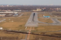 Chicago O'hare International Airport (ORD) - Chicago, Illinois -O'Hare International Airport,  RWY 9L as seen on short final for RWY 14R KORD. KLM 744 is in position on the parallel 14L waiting to depart. - by Mark Kalfas