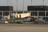 Chicago O'hare International Airport (ORD) - Chicago, Illinois - Chicago Fire Department - O'Hare Airport Rescue 2, Engine 10 and Ambulance 16   responding to a call at the Delta Airlines Terminal 2, Gate E10. - by Mark Kalfas