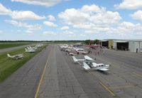Chandler Field Airport (AXN) - View of the ramp during the latter hours of the 2012 fly-in lunch. - by Kreg Anderson