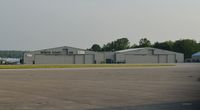Erie Intl/tom Ridge Field Airport (ERI) - North Coast Air's hangars at KERI.  - by aeroplanepics0112