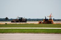 Sebring Regional Airport (SEF) - Volvo Road Grader and Komatsu D 41P Track Dozer work on Runway 18/36 at Sebring Regional Airport, Sebring, FL  - by scotch-canadian