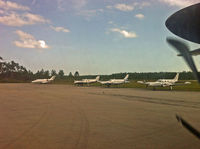 Treasure Cay Airport - Parked planes as we taxi to the gate at TCB - by Murat Tanyel