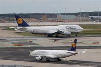 Frankfurt International Airport, Frankfurt am Main Germany (EDDF) - Some feet and 19 years on duty are between those two at rwy 25C.... - by Holger Zengler