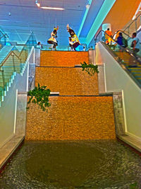 Lynden Pindling International Airport (Nassau Intl) - The waterfalls leading up to the US departure gates - by Murat Tanyel