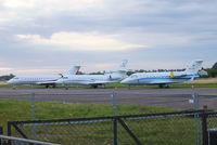 Cranfield Airport, Cranfield, England United Kingdom (EGTC) - bizjets parked at Cranfield with visitors for the opening of the London 2012 Olympic games. From L to R are N1812C, N747RL and HB-JRQ - by Chris Hall