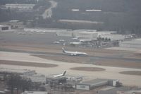 Charlotte/douglas International Airport (CLT) - Further down, as we still can see the ATI DC-8 coming to a stop on the runway.  One of Jack Roush (NASCAR owner) former 727-100s sitting without engines on the ramp - by Florida Metal