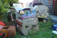 EIAB Airport - the bone yard behind the hangars at Abbeyshrule - by Chris Hall