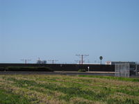 Oxnard Airport (OXR) - Recent Installation of Rwy 25 alignment approach lights-off and on-airport - by Doug Robertson