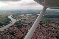 EDRY Airport - D-EGBW overfly of the City of Speyer. Speyer airfield ( ZQC / EDRY )  is clearly visible in the middle of the pic. The dome of Speyer and Speyer Technik Museum are visible as well including ex Lufthansa 747-230B(M) D-ABYM and Antonov AN-22 UR-64460 - by Thomas M. Spitzner