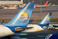 Manchester Airport, Manchester, England United Kingdom (EGCC) - Thomas Cook tails - by Chris Hall