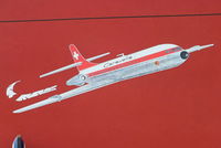 Geneva Cointrin International Airport, Geneva Switzerland (LSGG) - Caravelle painted on the wall of a cafe at Geneva airport - by Chris Hall